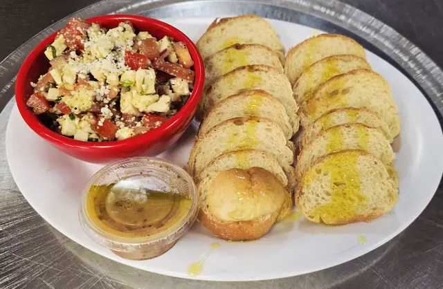 Tomato bruschetta with toasted garlic bread slices