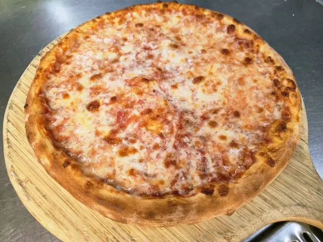 New York style cheese pizza from the Napoli kitchen