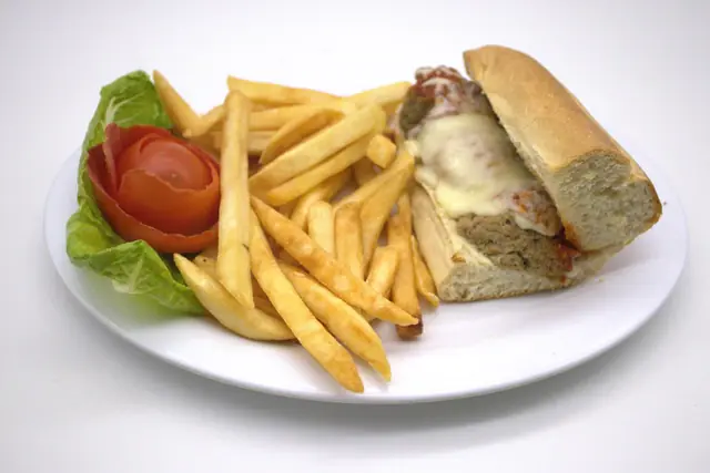 Steak and cheese sub with fries